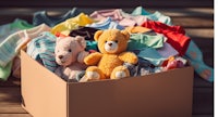 a box full of clothes and teddy bears